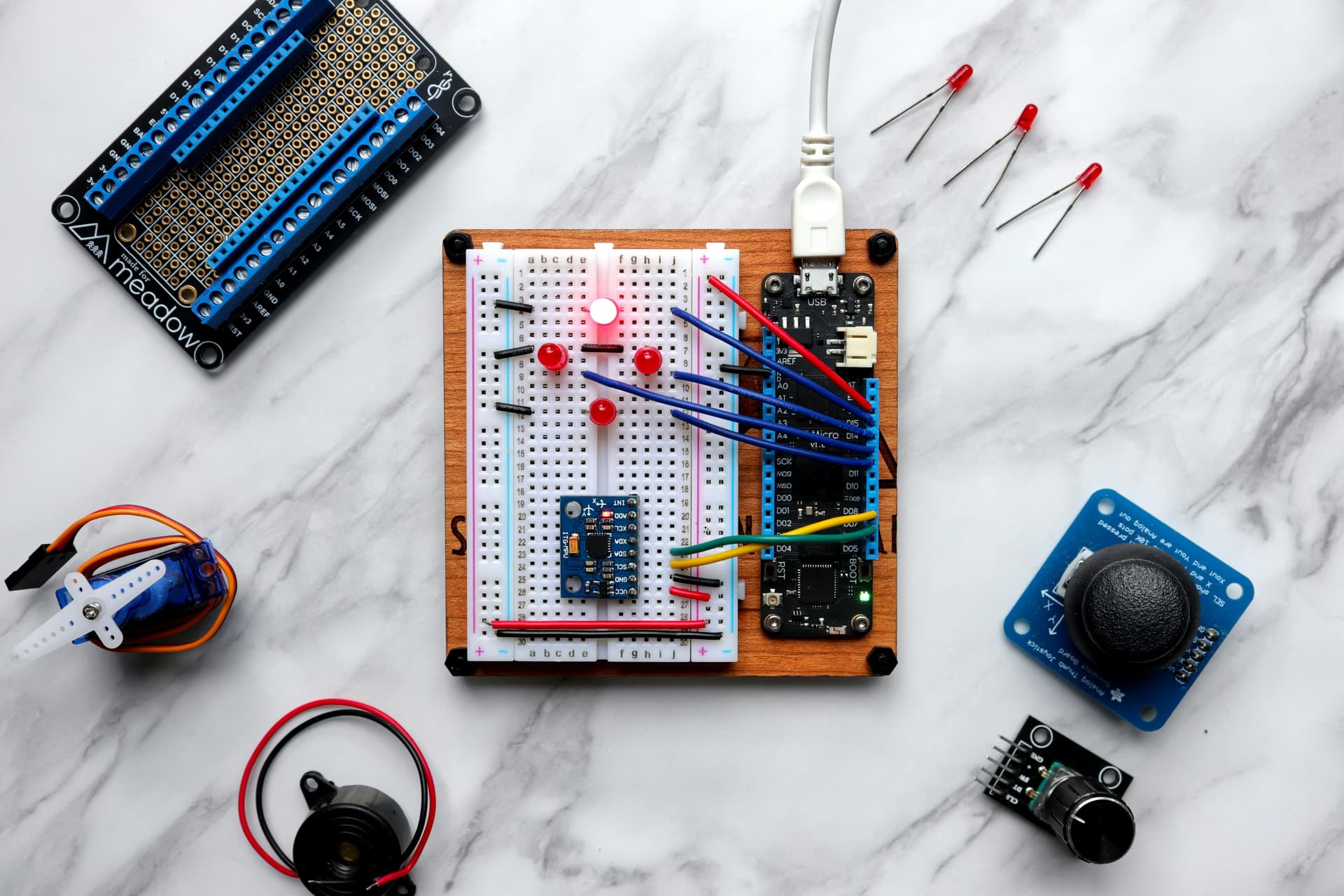 Students building Arduino circuits during a Cnipbotics class